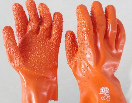 Orangefarbene Pellethandschuhe für Kälteschutz